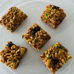 Crunchy Mamra Chikki Square (Puffed Rice Brittle) A picture of Crunchy Mamra Chikki Square (Puffed Rice Brittle).