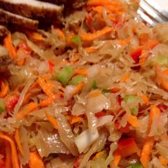 A picture of Cider-brined Roasted Pork Tenderloin with Apple-sauerkraut Slaw.
