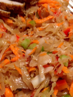 A picture of Cider-brined Roasted Pork Tenderloin with Apple-sauerkraut Slaw.