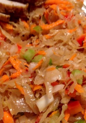 A picture of Cider-brined Roasted Pork Tenderloin with Apple-sauerkraut Slaw.