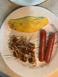Cheese Omelette with Tomato Confit and Sausages