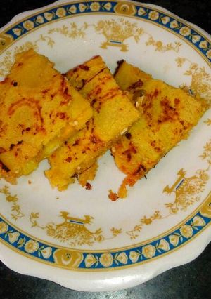 A picture of Stuffed paneer corn pancake.