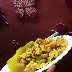 A picture of Sweet potatoes with scrambled eggs.