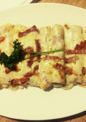 Una foto de Puerros gratinados con jamón y queso