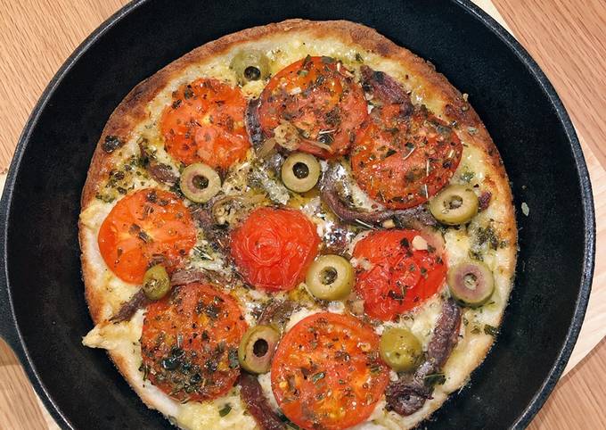 Anchovy olive tomato pizza