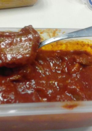 Una foto de Lengua de puerco en adobo rojo
