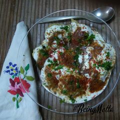 Green Mung dal Dahi Vada A picture of Green Mung dal Dahi Vada.