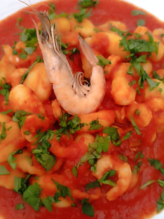 A picture of Gnocchi with Shrimp and Arugula.