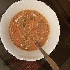 A picture of Hot and Sour chicken soup.