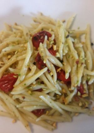 A picture of Pasta with pistachio pesto and roasted tomatoes.