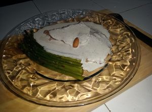 Una foto de Pescado al limón con crema de almendras