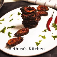 A picture of Baked Karela.