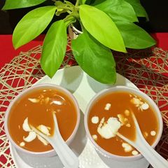 A picture of Tomato Carrot Soup.