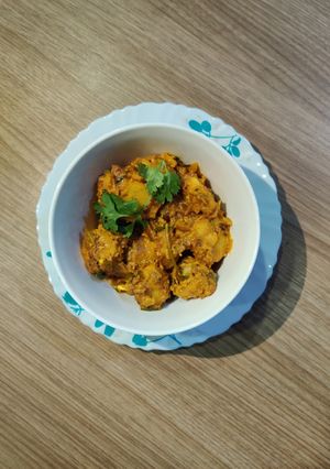 A picture of MASALA ARBI with COCONUT MILK.