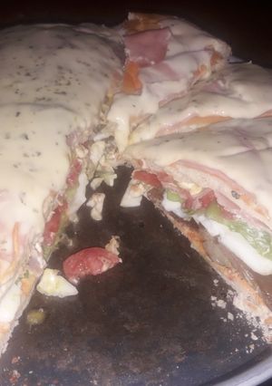 Una foto de Lomo Pizza.🍕