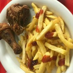 A picture of Chips and fried chicken.
