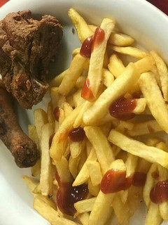 A picture of Chips and fried chicken.