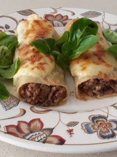 Una foto de Canelones de carne y manzana