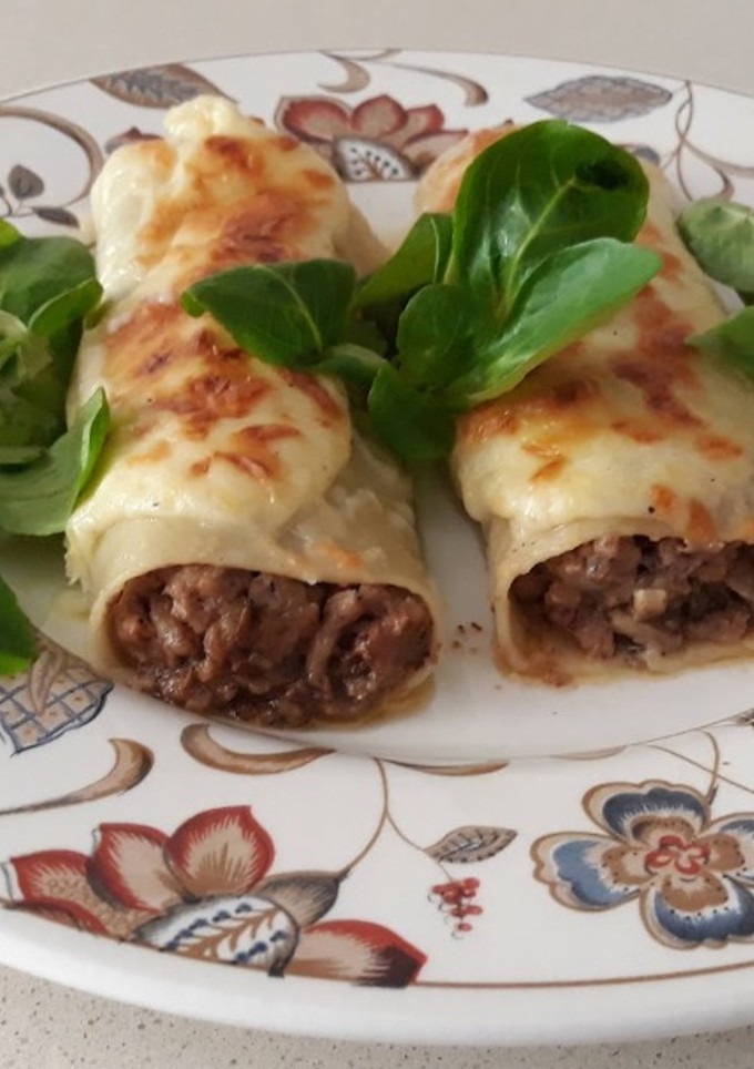 Una foto de Canelones de carne y manzana