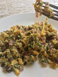 Una foto de Huevos verdes con queso