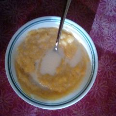 A picture of Cornmeal Mush With Brown Sugar & Milk.