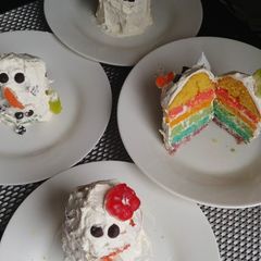 A picture of 🌈 Our little rainbow snow men that turned to be monsters 😂😂.