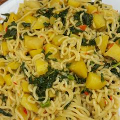 A picture of Noodles with irish & spinach.