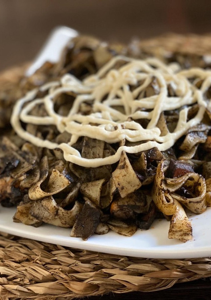 Una foto de Tagliolini negros