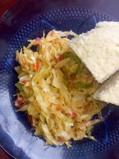 A picture of Fried cabbage and ugali.