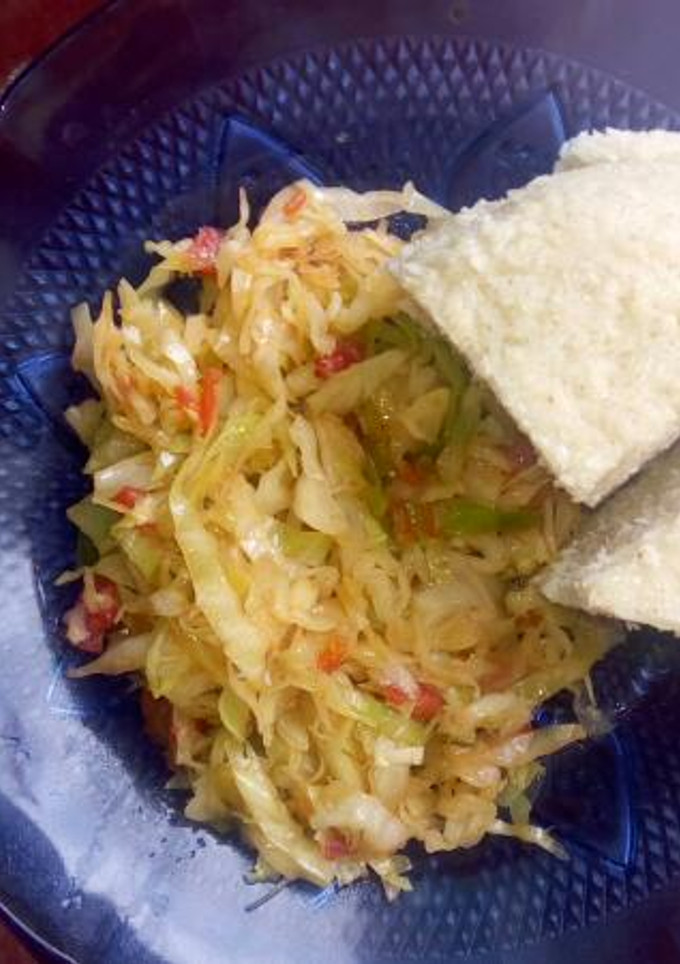A picture of Fried cabbage and ugali.
