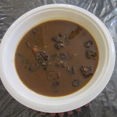 A picture of Vathakuzhambu/ Vathal kuzhambu (Dried Vegetables Curry).
