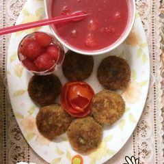 Vegetables kababs with watermelon juice A picture of Vegetables kababs with watermelon juice.