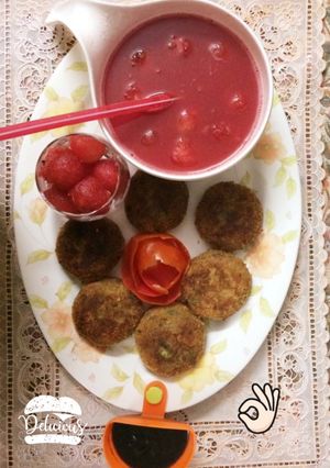 A picture of Vegetables kababs with watermelon juice.