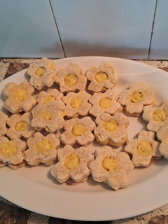 Una foto de Lunettes de coco rellenos con crema de vainilla