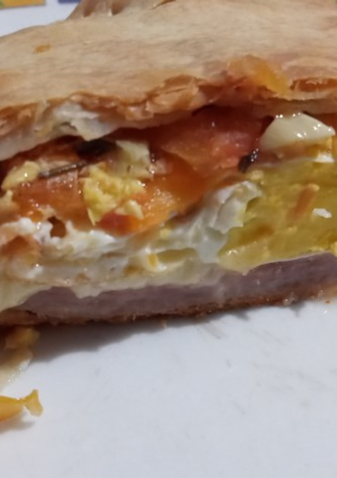 Una foto de Tarta de jamón y queso a la napolitana