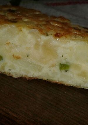 Una foto de Tortilla de papa con cebolla y morrón