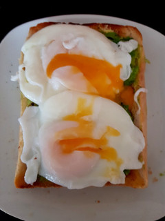 A picture of My Poached Eggs & Avocado on Toast. 💜.