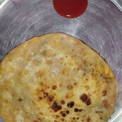 Paratha with leftover potato masala A picture of Paratha with leftover potato masala.
