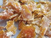 Una foto de naranjas de naranja confitada