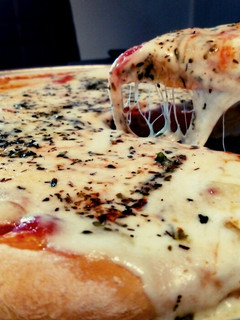 Una foto de Pizza de Amparo (con tuco casero)
