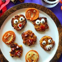 A picture of Monster Face Fritters and Chakli.