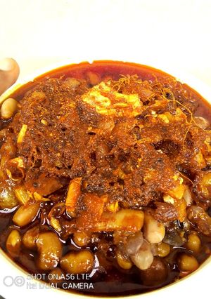 A picture of Unpeeled Ginger Ewa Agoyin Sauce.