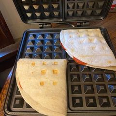 Hawaiian pizza waffle / pizza flip A picture of Hawaiian pizza waffle / pizza flip.