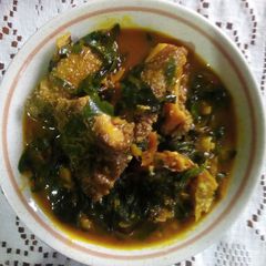 A picture of Bitter leaves and Oziza leaves soup.