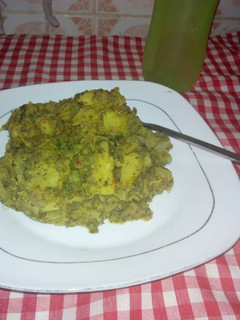 A picture of Sweet potato porriage with bitter leaf,curry leaf and scent leaf.