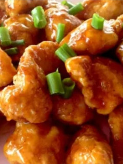 Una foto de Pollo a la naranja