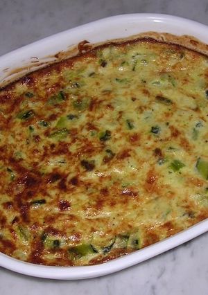 Une photo de Gratin de courgettes aux oignons