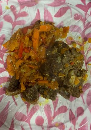 Una foto de Osobuco con verduras