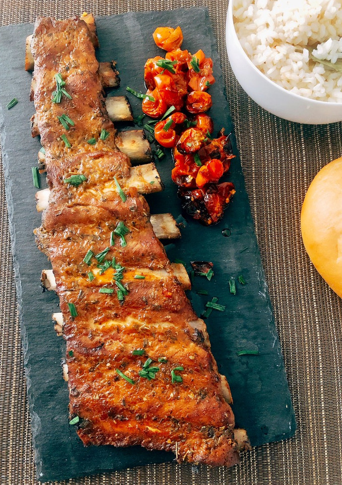 Una foto de Costillas churrasco con mostaza, miel y mandarina