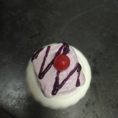 A picture of Black current ice cream.